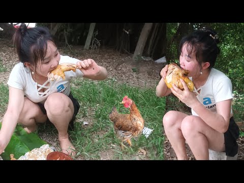 The girl has the skill of grilling chicken covered in dirt