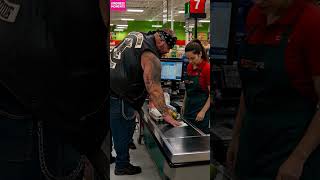 kindness biker 🏍 helps senior at grocery checkout #kindness #grocery #shorts