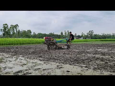Cultivating land with a power tiller machine is a different kind of pleasure.