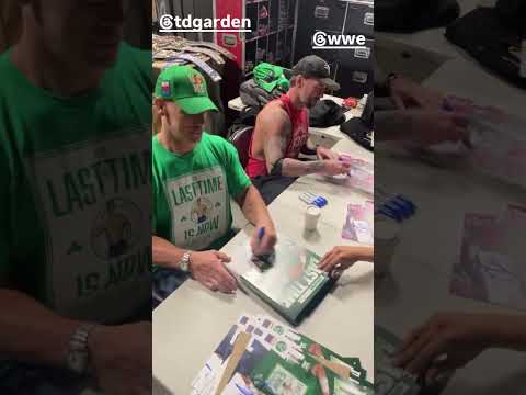John Cena and CM Punk signing autographs backstage ahead of RAW tonight in Boston.