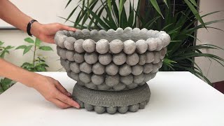Amazing idea from cement marbles to create extremely artistic flower pots