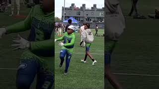 Clips of Malcolm catching the ball before 7 on 7 game