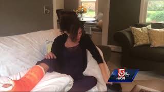 On the mend: Cindy sports orange cast post surgery