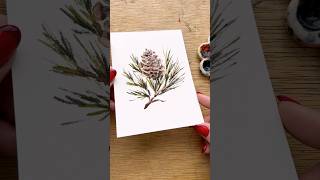 Simple glittery watercolor pinecone for day 6 of watercolor holiday card making ￼