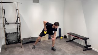 Rematore con kettlebell a un braccio con presa neutra