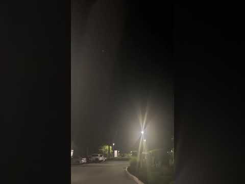 Caught on Camera: Mysterious Red Orb Over Houses!