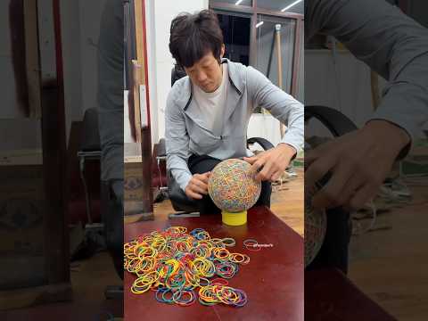 unbelievable giant football made out of lots of rubber bands #shortvideo