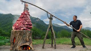 Slow-Cooked Beef Leg Inside a Smoldering Log Over Fire