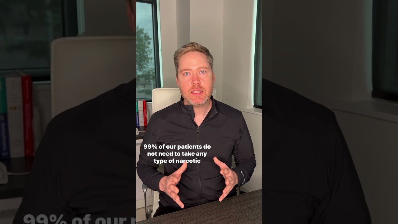 Doctor discussing patient pain management options.