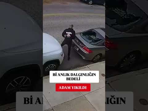 Aracına bavulu yanlış yerleştirince arka camı patladı. Üzüntüsünden aracına dönüp bakamadı.