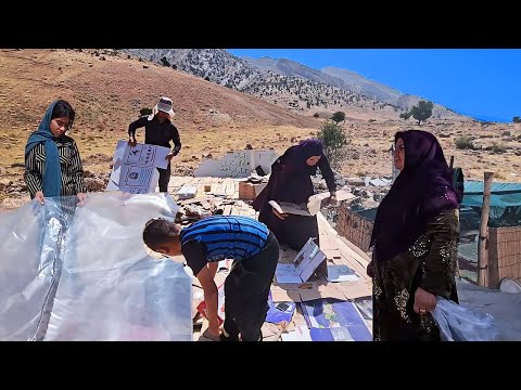 Finally building a shelter for Fariba: Reza completes the roof
