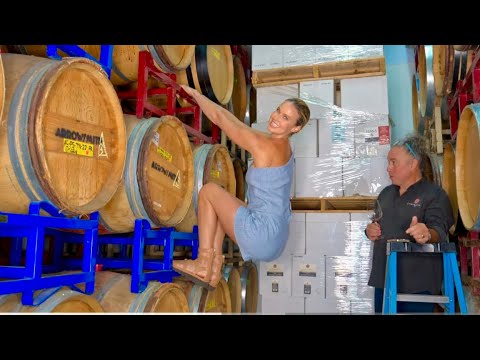 Staging the next shot at Labyrinth Winery with Model Iggy climbing up the barrels