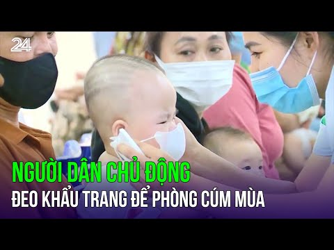 Người dân chủ động đeo khẩu trang để phòng cúm mùa | VTV24