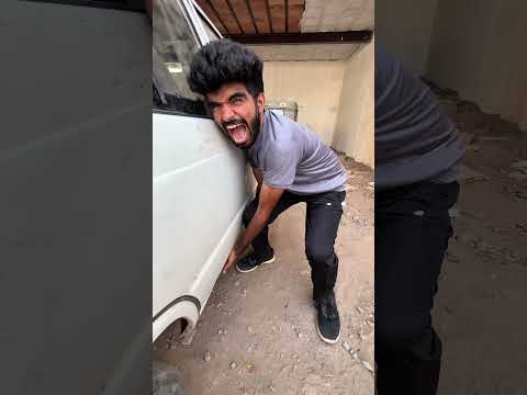 A big snake got inside this car