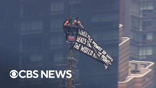 YouTube video thumbnail: Couple That Stunned NYC by Climbing Empire State Building Could Face Prison Time