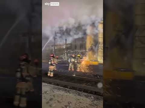 Train fire shuts down roads in downtown Las Vegas