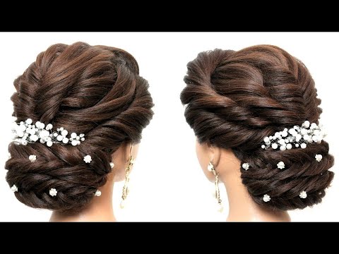Low bun updo.  Bridal hairstyle for long hair.