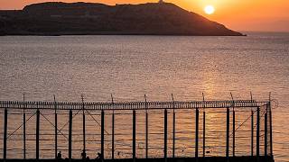 YouTube video thumbnail: Hundreds of Migrants Swim From Morocco to the Spanish Territory of Ceuta
