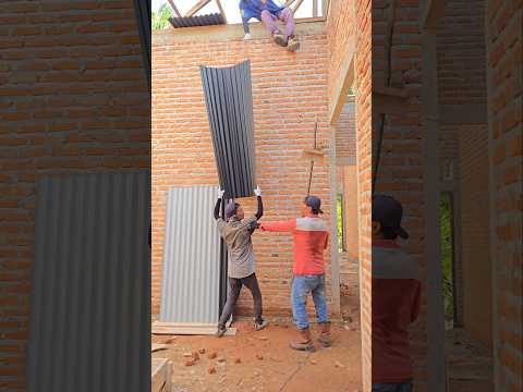 Wow.. really creative..!!! This senior builder made a tool to lift zinc roofs up..