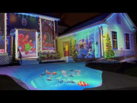 Dad Transforms Home for Christmas Using Projections