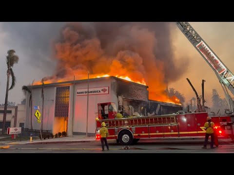 Firefighters continue to fight flames during the Eaton fire in the Altadena area of LA | AFP