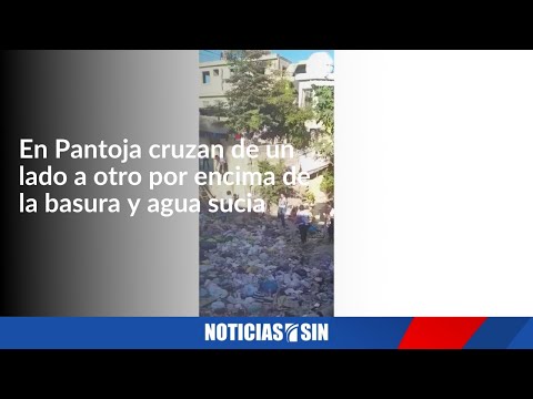 Por agua sucia y basura, cruzan niños de un lado a otro en Pantoja