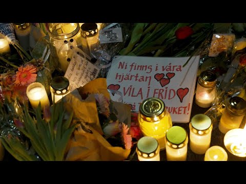 Candlelight vigil honours victims of Sweden's worst mass shooting | AFP