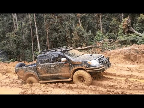 Toyota Hilux On Slippery Mud Hill Climb - Double Cab Truck In Mud Route