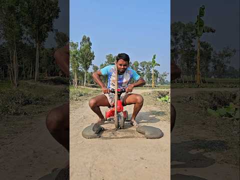 A Little boy is having fun with his bicycle?