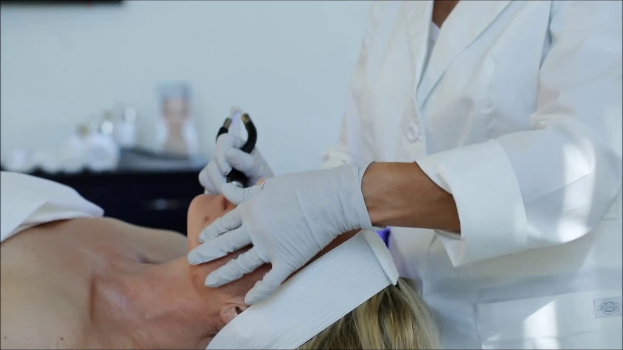Skincare treatment in progress at a spa.