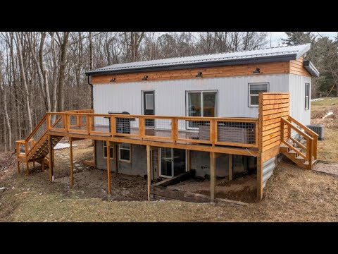 Would You Live in This Amazing Container Home in the Woods?