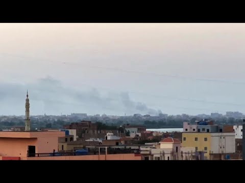 Smoke billows after a drone attack near Khartoum airport area ahead of reopening | AFP