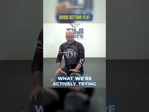 Going flat on your back under pressure is the fastest way to get smashed. John Danaher shows the