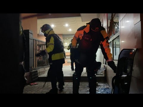 Seoul: Riot police, damaged court building after S Korean president's detention extended | AFP