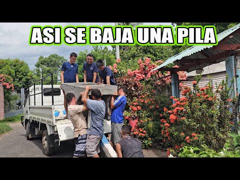 Ayudamos a Barbita a bajar la pila en su casa.