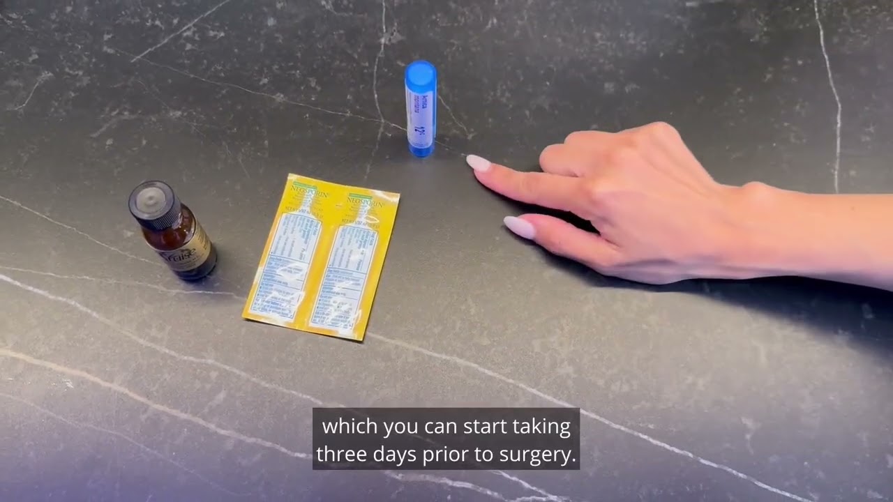 Two medication packages and a finger pointing.