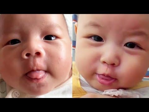 Babies sticking out tongue. Cutest baby funniest moment.