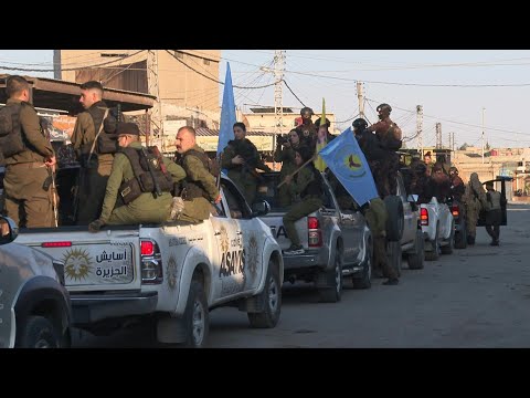 Forces of Kurdish-led administration in northeast Syria hold parade | AFP