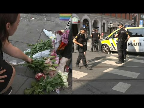 People lay flowers at site of Oslo shooting | AFP