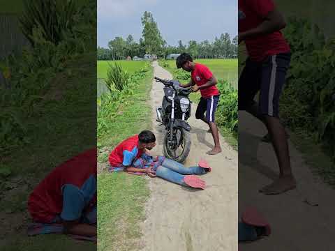 The front wheel of the bike is above the feet.11