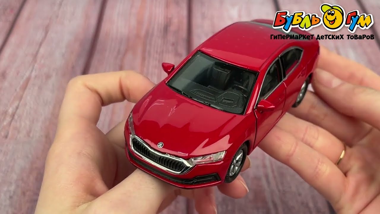 Машинка Skoda Octavia Welly металлическая инерционная 1:38 в ассортименте - видео