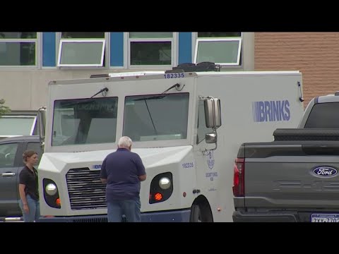 Worker fires gunshots at 2 men trying to rob armored vehicle Tuesday