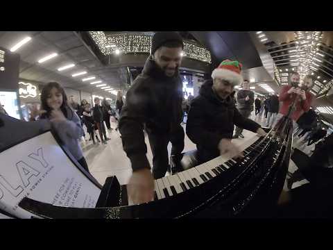 Getting down with Boogie Santa at the street piano