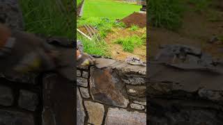 The final reveal of this stone wall #asmr #construction