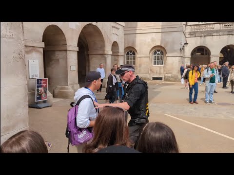 Armed police officer I'm withdrawing your right be here and you can blame him disrespectful tourist