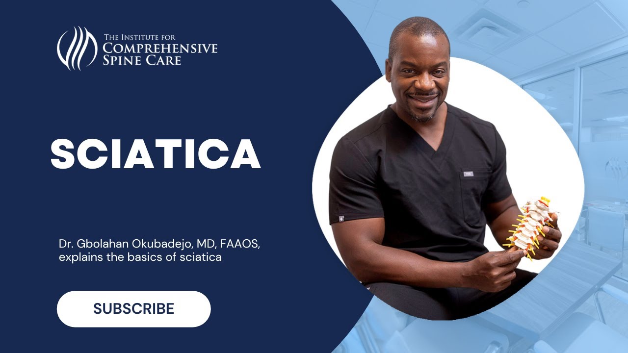 Doctor discussing sciatica basics with spine model.