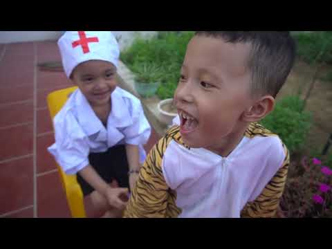 Outdoor playground with fun kids and baby cute at play center color toy and nursery rhymes for babie