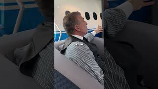 Showing The Jet Business video wall to a client.