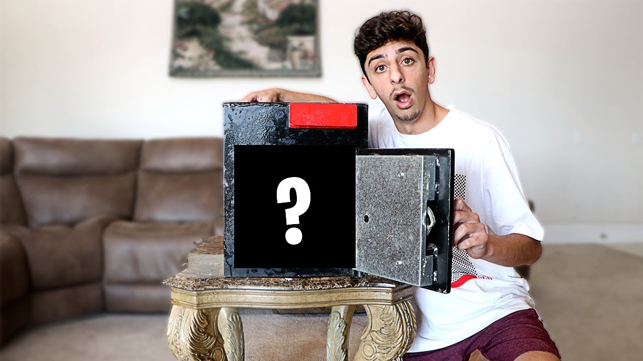 REVEALING WHAT'S INSIDE THE SECRET SAFE.