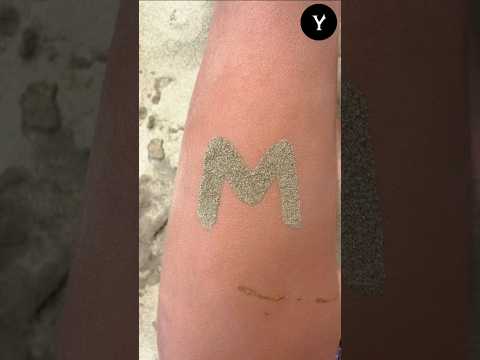 this girl make tattoo only with sand